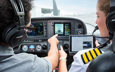 A pilot driving a plane