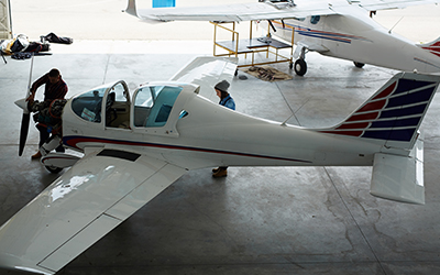 Maintenance being performed on an aircraft