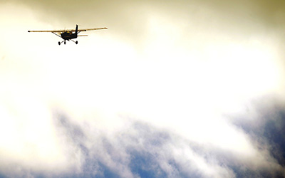 Plane in sky at distance