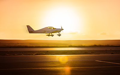 A small plane on the runway