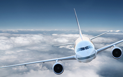 An airplane flying in the clouds