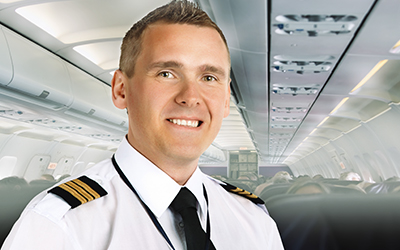 Airline pilot smiling