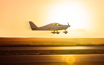 A small cirrus plane on the runway