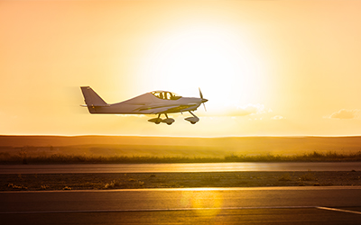 A small plane on the runway